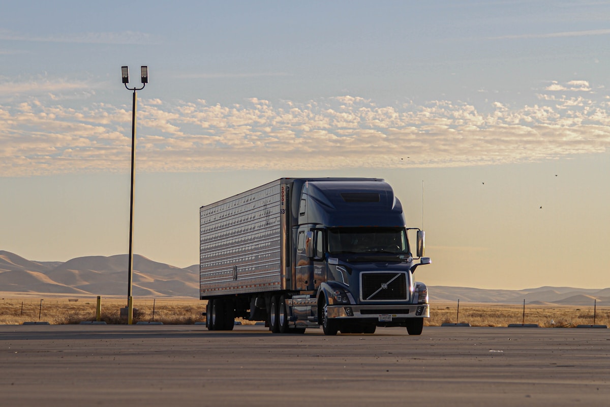 E K B TRUCKING LLC tractor-trailer running at speed